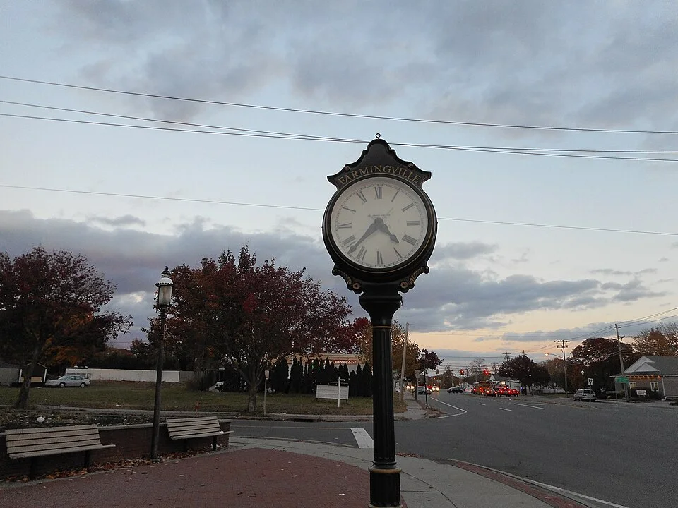 Woodycrest sidewalk clock in Farmingville, NY, served by E and J Cleaning Services
